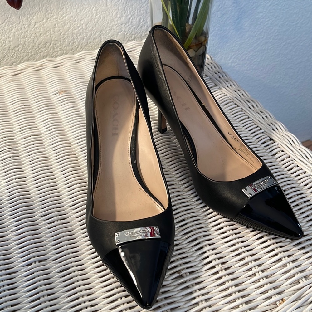 COACH “ZAN” black patent & leather heels, with silver “Coach” emblem. Size 9.